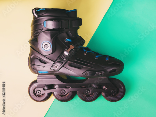 Obraz na płótnie Roller skates on pastel flat lay background