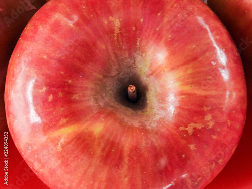 Top view of an round fresh red apple.Apple background and texture.Natural ripe and raw fruit.