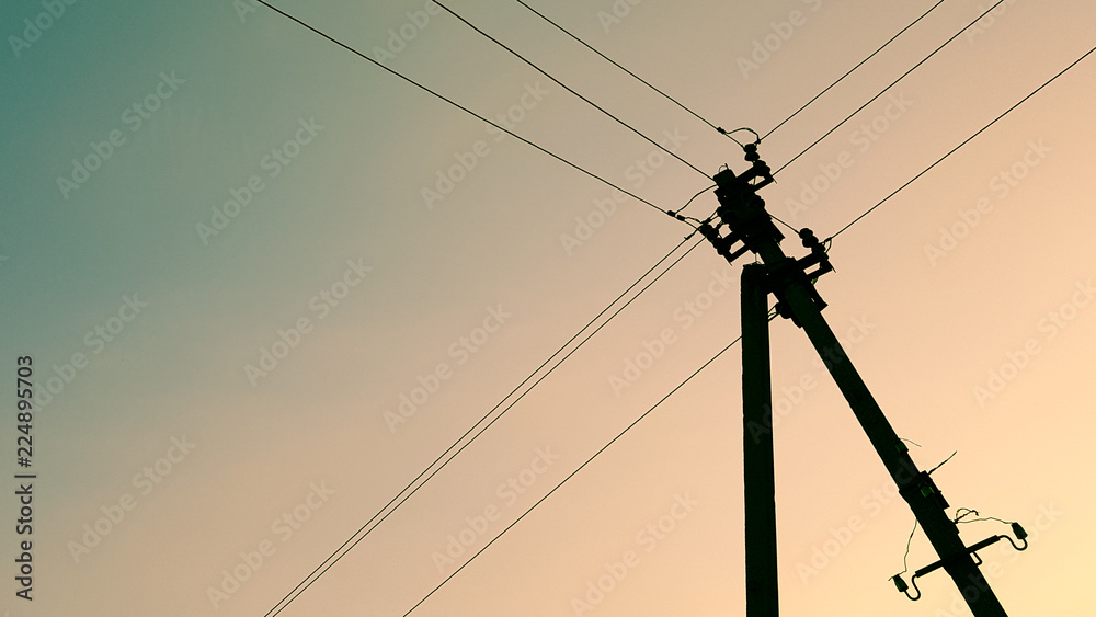 electric pole with twilight blue sky and white clouds electric pole with twilight blue sky and white clouds