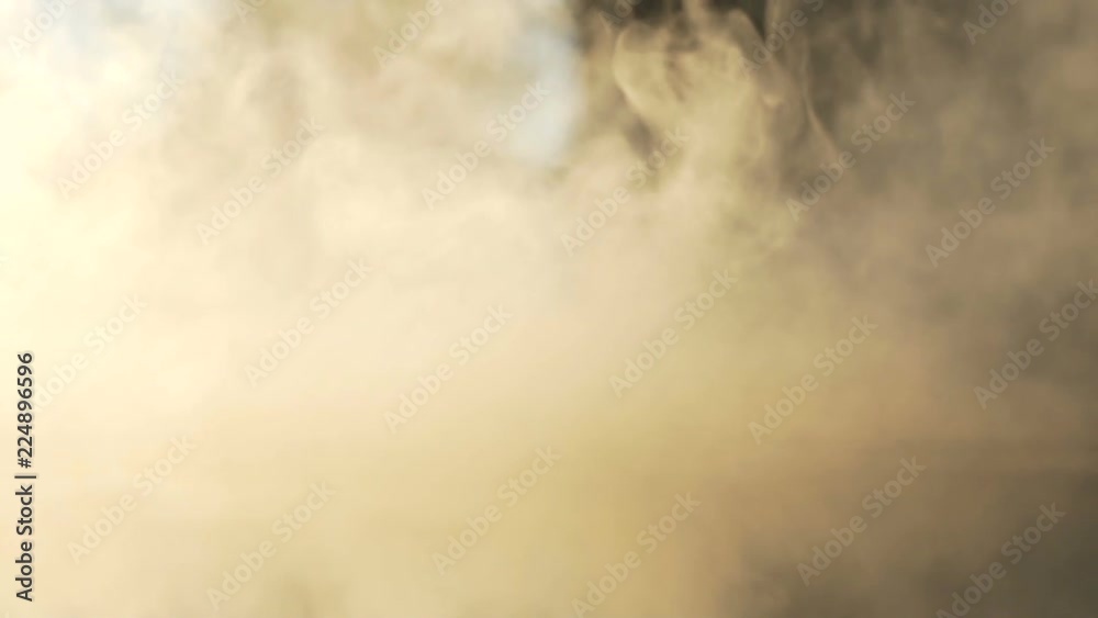 Macro shot of dense clouds of smoke and toxic vapor at camera Macro shot of dense clouds of smoke and toxic vapor at camera