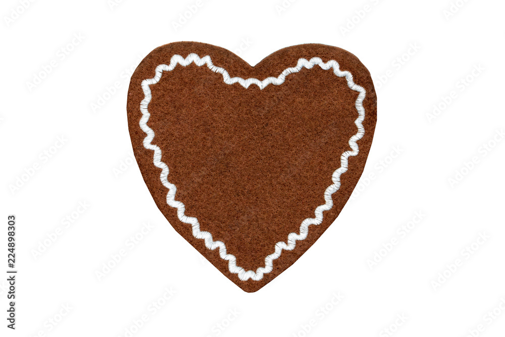 textile Gingerbread heart shape valentines day gift with copy space on white isolated background.