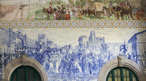 Azulejo panel in Sao Bento Railway Station in Porto, Portugal photo