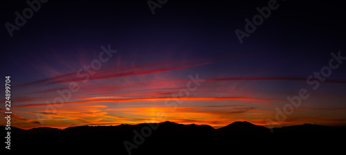 Slika na platnu Beautiful autumn sunset landscape with a lot of colors like red, purple, blue