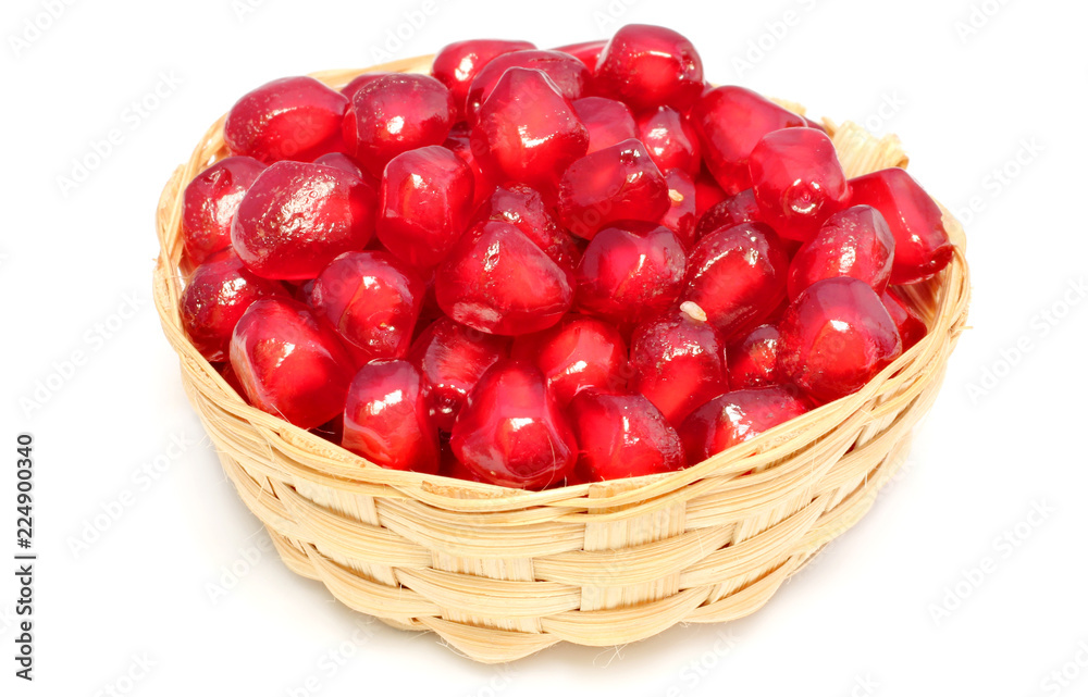 Red Pulp of pomegranate fruit on bamboo basket Red Pulp of pomegranate fruit on bamboo basket