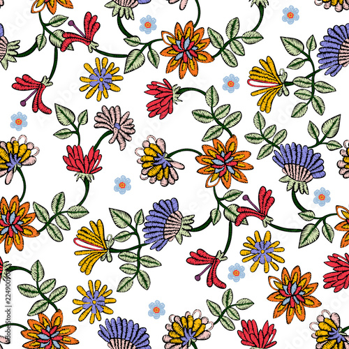 Embroidery seamless pattern with ethnic flowers. Vector embroidered floral patch for clothing design.