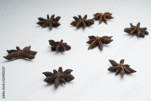 Cinnamon and Anise on white background isolated