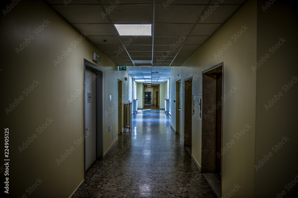 view of an abandoned psychiatric hospital corridor