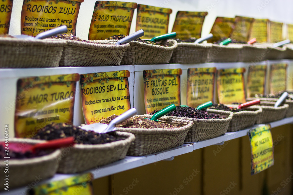 spices in store placed in baskets