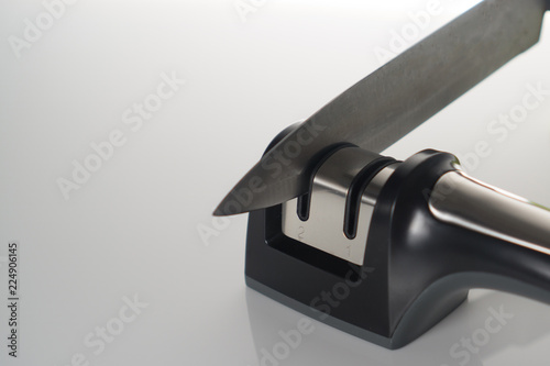 Wallpaper Mural Kitchen Knife sharpener on white Torontodigital.ca