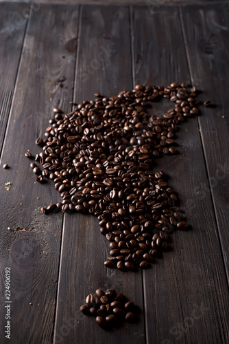 roasted coffee beans, can be used on a wooden dark background