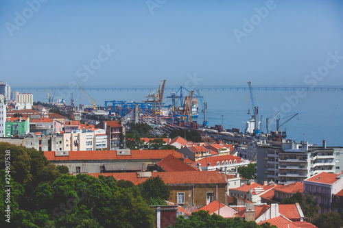 Beautiful super-wide angle aerial panoramic view of Lisbon, Portugal, with Alfama district and historical old town, seen from the observation deck belvedere