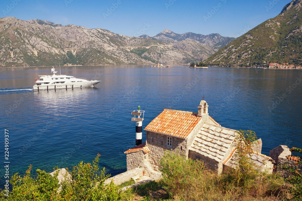 Beautiful Mediterranean landscape. Montenegro, Adriatic Sea. View of Bay of Kotor, Church of Our Lady of the Angels and two small islands (Our Lady of the Rocks and St. George)