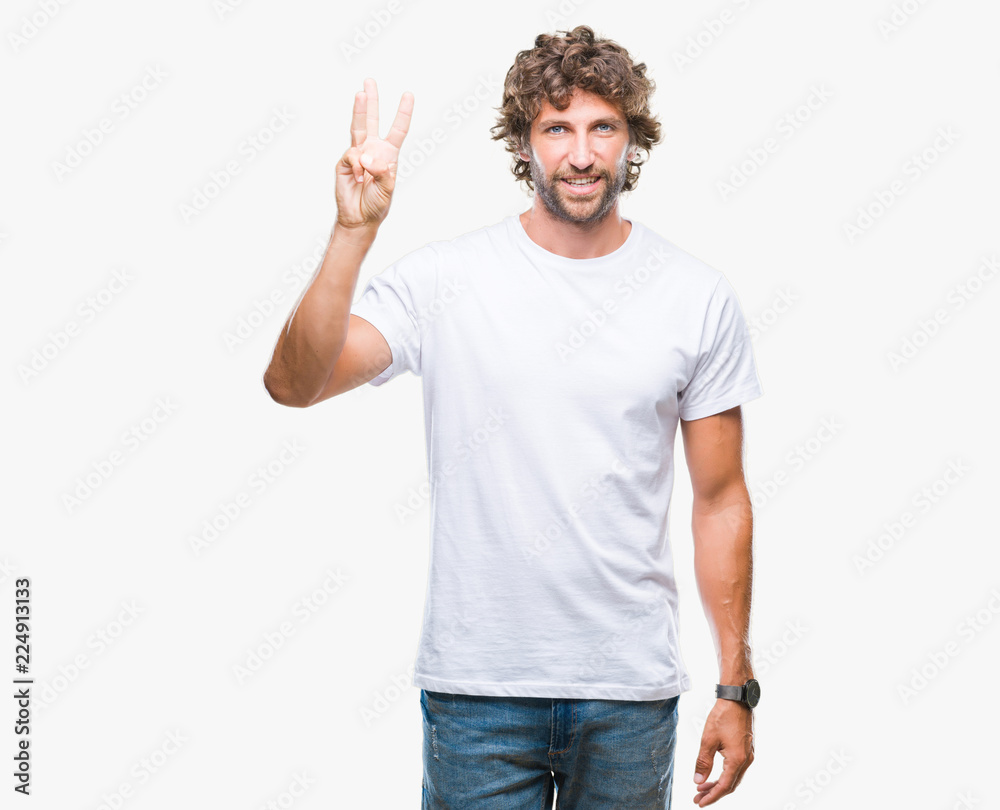 Handsome hispanic model man over isolated background showing and pointing up with fingers number three while smiling confident and happy. Handsome hispanic model man over isolated background showing and pointing up with fingers number three while smiling confident and happy.