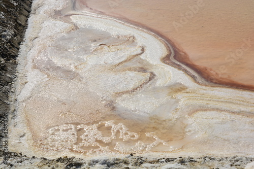 Salt evaporation ponds, also called salterns, salt works or salt pans photo