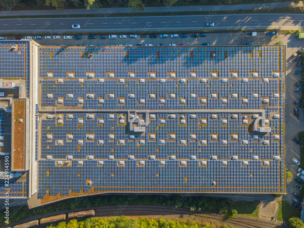 Aerial view of solar cells on rooftop for clean power generatino in Switzerland, Europe Aerial view of solar cells on rooftop for clean power generatino in Switzerland, Europe
