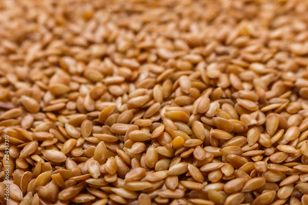 Seeds of golden flax on a white background Seeds of golden flax on a white background