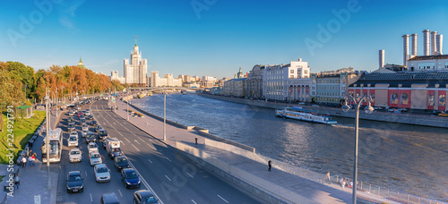 Moscow. September 20, 2018. Moskvoretskaya and Raushskaya embankments of the Moscow River. Stalinist skyscraper on the Kotelnicheskaya Embankment. View from the soaring bridge in the park Zariadye photo