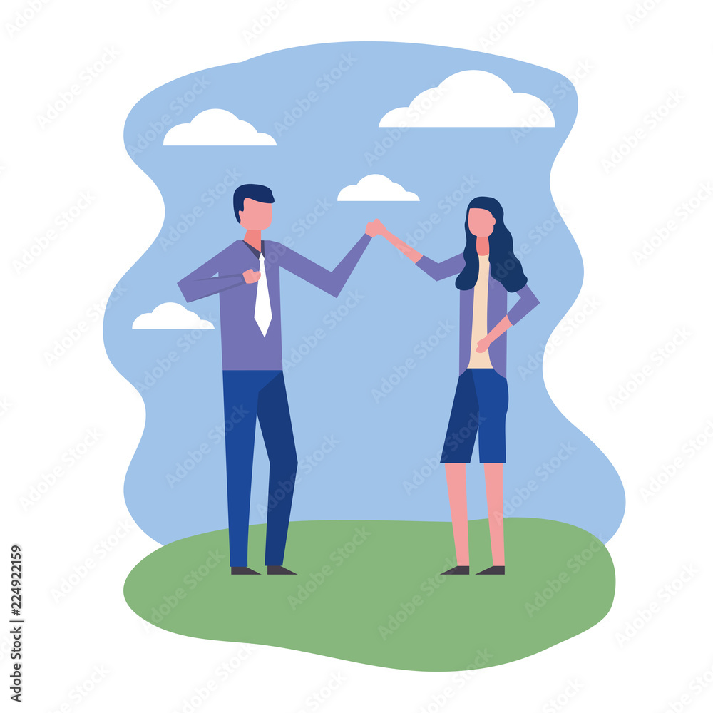 business couple dancing in landscape