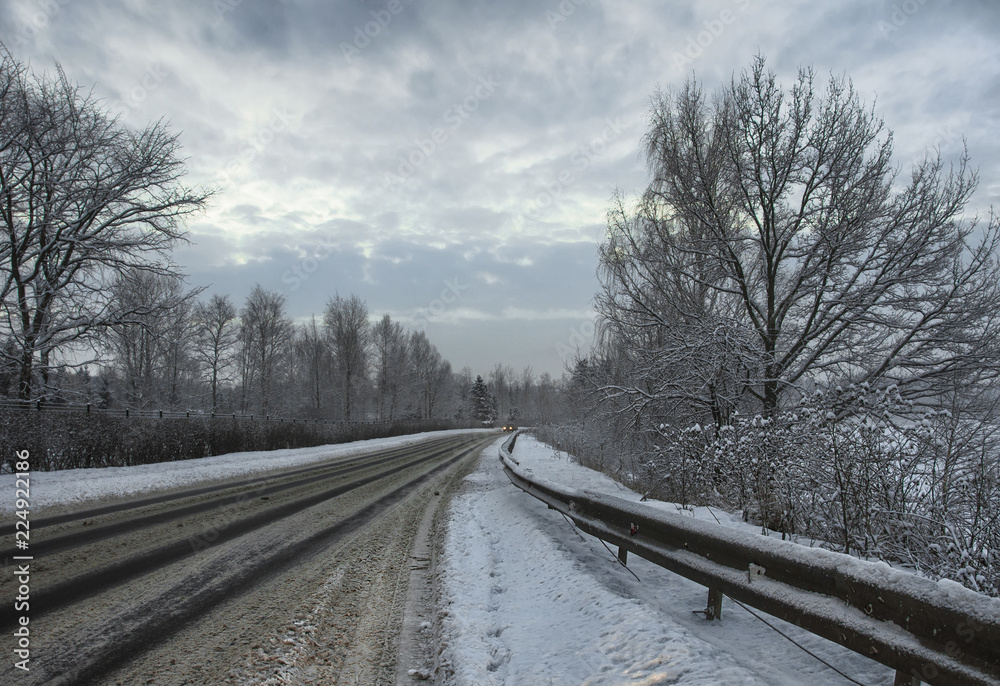 Snowy January morning in Nevsky forest Park. The Bank of the river. Snowy January morning in Nevsky forest Park. The Bank of the river.