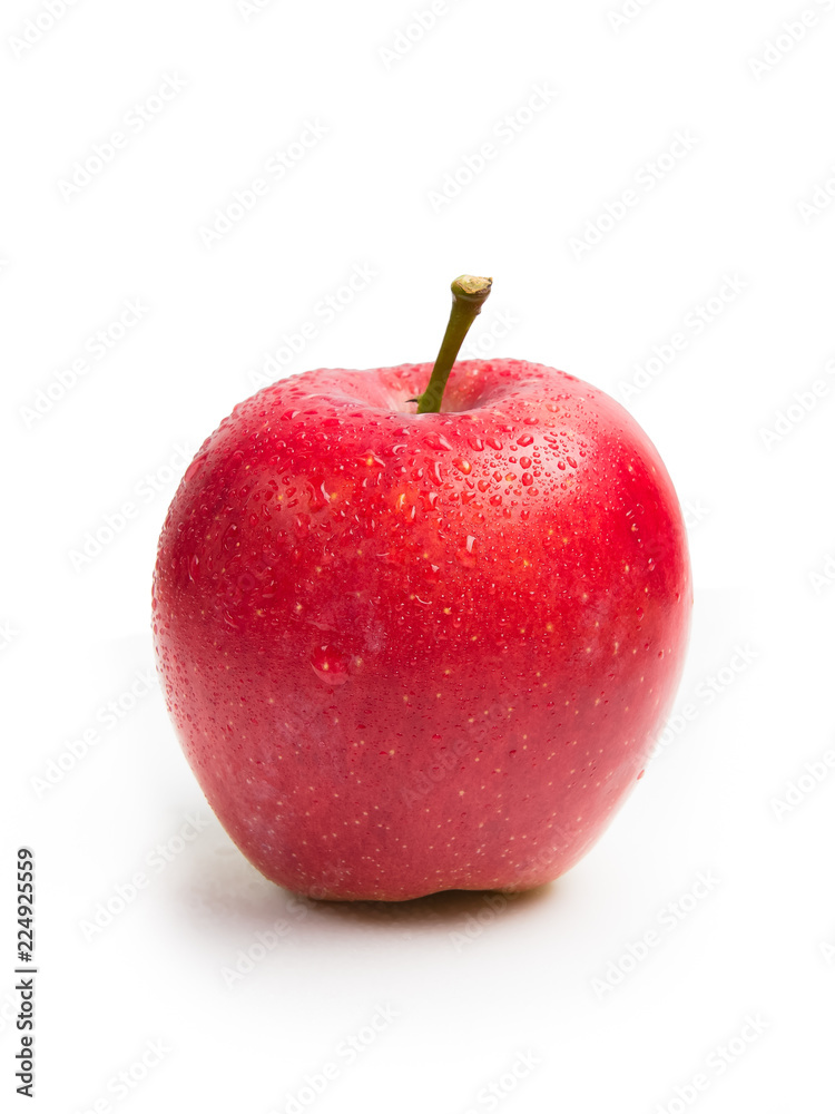 Wet red apple isolated on white background. The fruit is covered with water drops. Wet red apple isolated on white background. The fruit is covered with water drops.