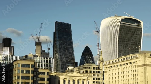 Wide shot of modern cityscape with financial district, London, England photo