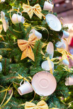 Closeup on Christmas tree decoration over festive background