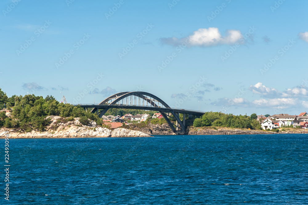Obraz premium Norway, Stavanger region, Hogsfjorden. Hogsfiord. Bridge from Solyst to Engoy Island. On a cruise to Lysefjord, Lysefiord. Leaving Stavanger behind. Rogaland, Ryfylke scenic route.
