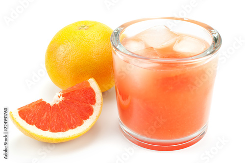 Fresh grapefruit juice on white background