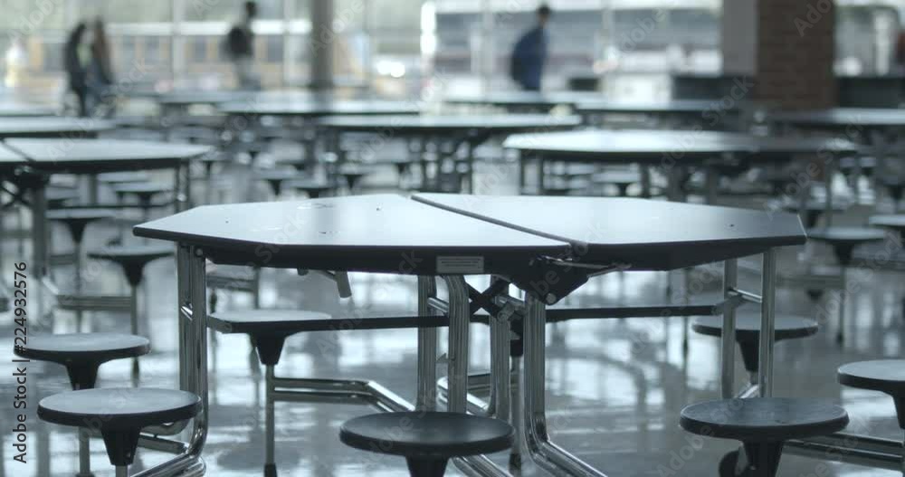 High School Cafeteria with Students Walking by on their way to Class