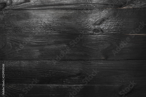 Wallpaper Mural Upper, top view of a black wooden blackboard background in old, rustic style Torontodigital.ca