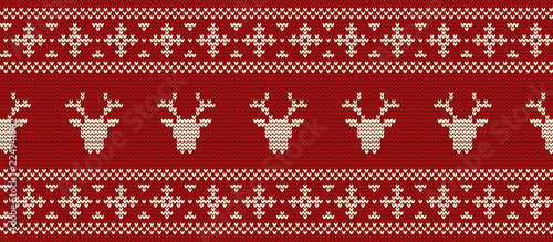 Christmas background. Knitted pattern with deer's heads on a red background. Ornament. Seamless border. Vector illustration.