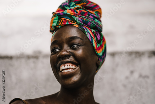 Smiling woman in headscarf