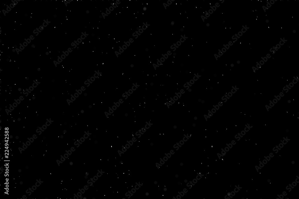 Falling down real white snowflakes on black background. Isolated snowfall calm snow minimalistic design element. Snowstorm texture. Bokeh lights on black background, shot of flying snowflakes in air Falling down real white snowflakes on black background. Isolated snowfall calm snow minimalistic design element. Snowstorm texture. Bokeh lights on black background, shot of flying snowflakes in air