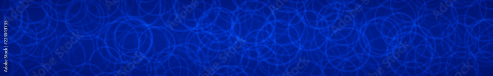 Abstract horizontal banner of randomly arranged contours of circles on blue background