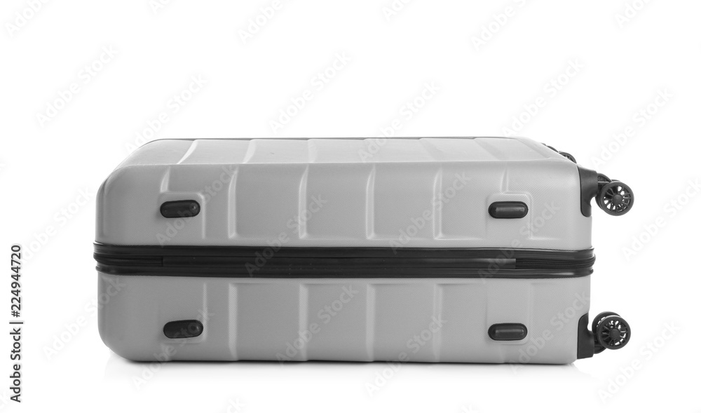 Grey suitcase for travelling on white background Grey suitcase for travelling on white background