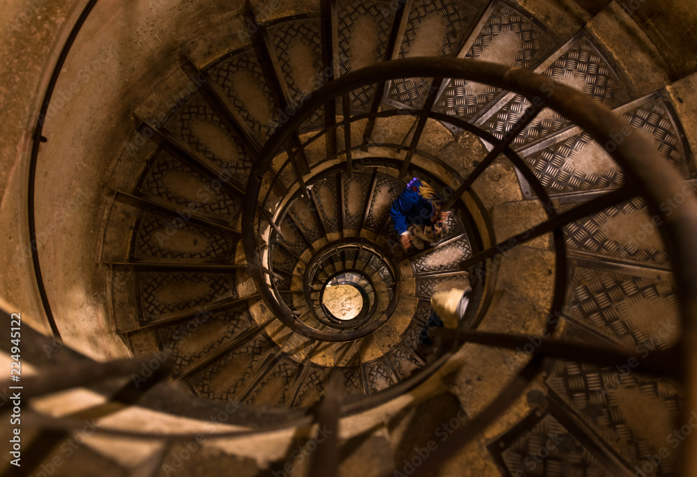 Fototapeta premium Round stairs overly used by tourists
