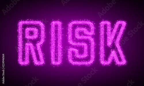 RISK - pink glowing text at night on black background