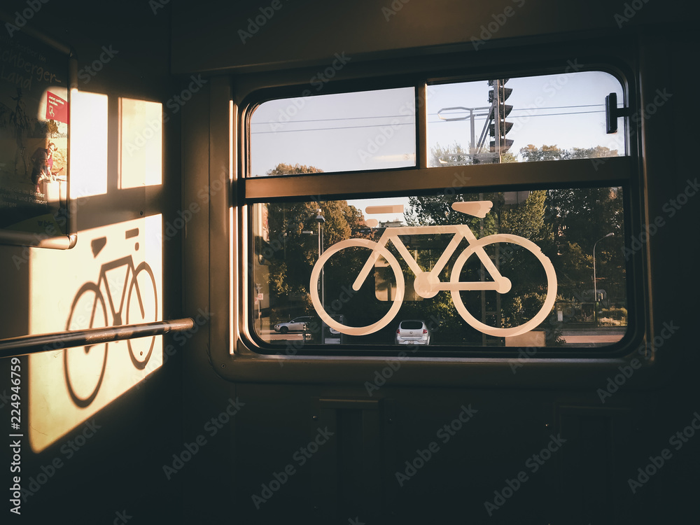 Fototapeta premium sticker of a bike on a train window