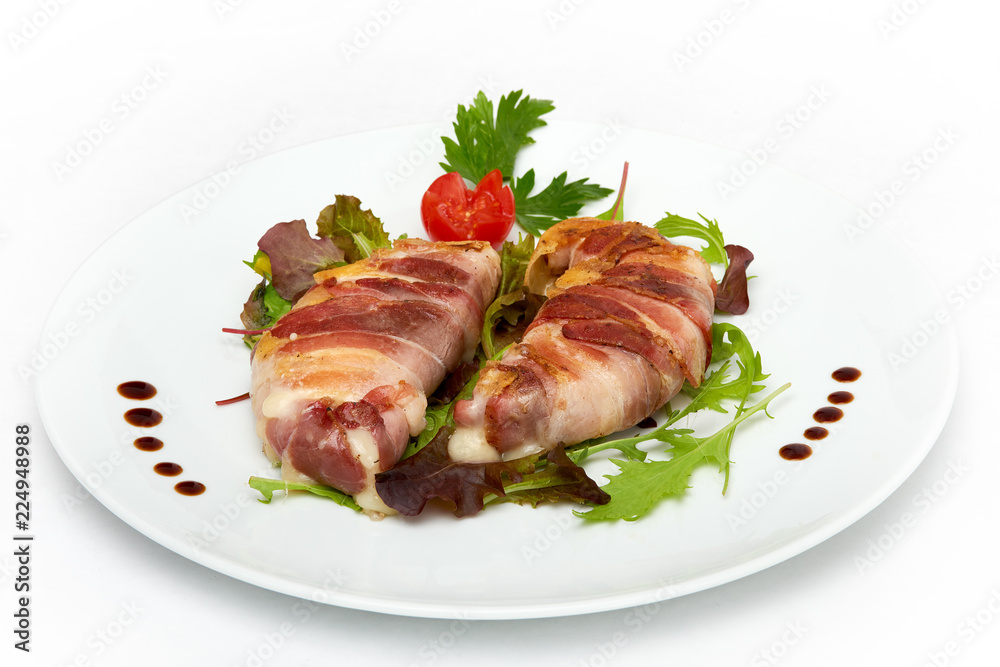 Italian food, Grilled provolone cheese with smoked panceta, served on white plate, isolated on white background Italian food, Grilled provolone cheese with smoked panceta, served on white plate, isolated on white background