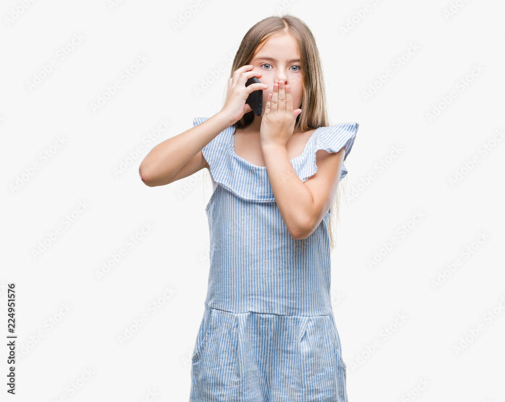 Young beautiful girl talking on the phone over isolated background cover mouth with hand shocked with shame for mistake, expression of fear, scared in silence, secret concept Young beautiful girl talking on the phone over isolated background cover mouth with hand shocked with shame for mistake, expression of fear, scared in silence, secret concept
