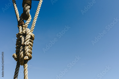 Rigging and ropes on an old sailing ship to sail in summer.