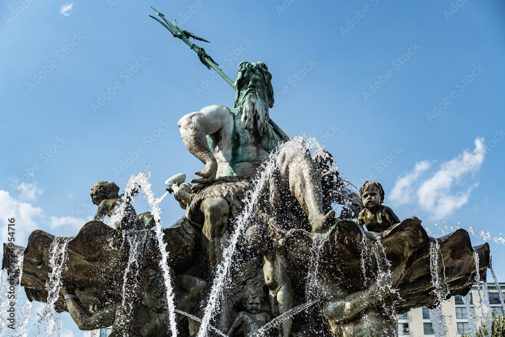 The Neptune Fountain in Berlin, or Neptunbrunnen, designed by Reinhold Begas. Located between the St Mary's Church and the Rotes Rathaus, behind Alexanderplatz.