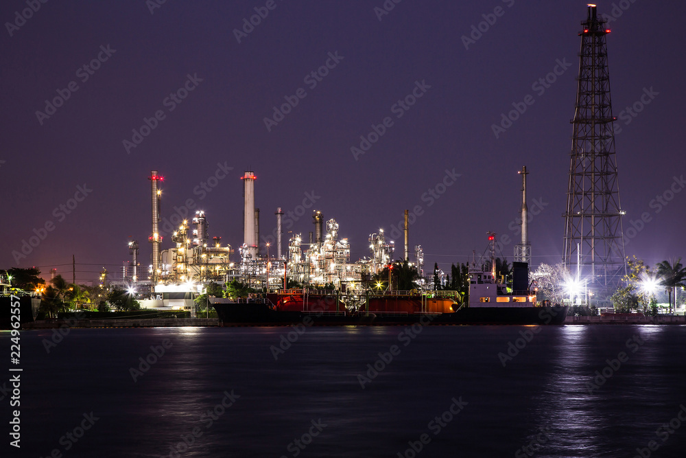 Oil refinery industry plant at night.
