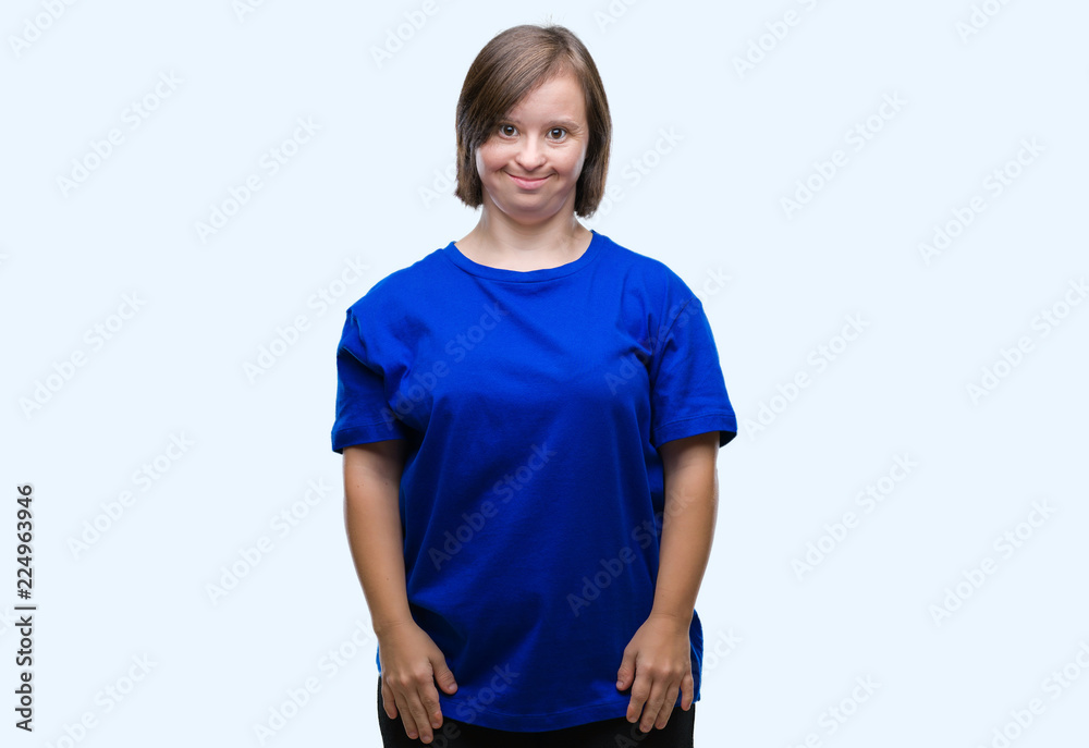 Fototapeta premium Young adult woman with down syndrome over isolated background with a happy and cool smile on face. Lucky person.