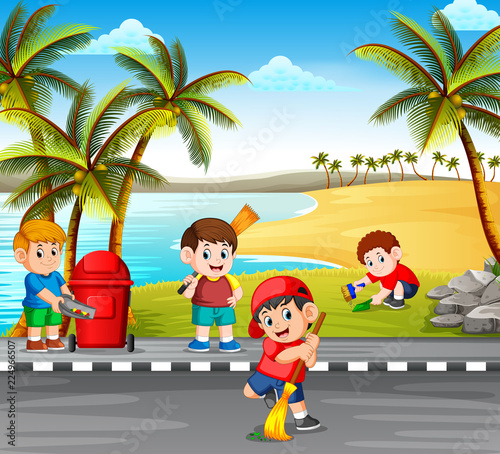 the children cleaning the road near the beach from the danger things to make it clean 
