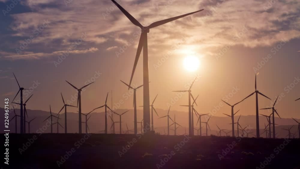Wind Turbine in a large wind farm in California. Renewable electric energy production.