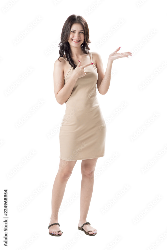 Cheerful young woman caucasian wearing light dress standing and posing on isolates white background.Lady joyful and charming smile. Cheerful young woman caucasian wearing light dress standing and posing on isolates white background.Lady joyful and charming smile.
