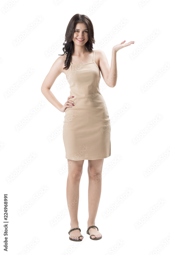 Cheerful young woman caucasian wearing light dress standing and posing on isolates white background.Lady joyful and charming smile. Cheerful young woman caucasian wearing light dress standing and posing on isolates white background.Lady joyful and charming smile.