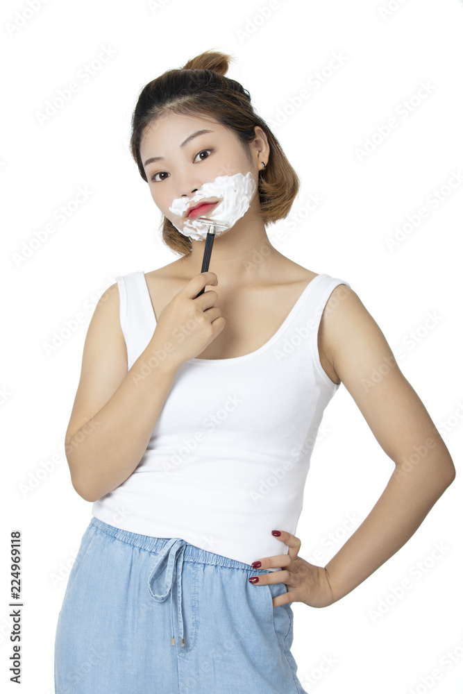 Chinese woman shaving isolated on a white background Chinese woman shaving isolated on a white background