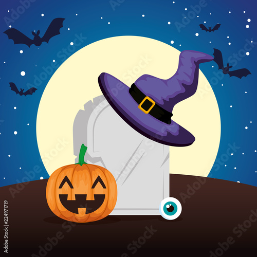 halloween gravestone with pumpkin and witch hat